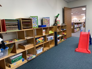 Collinsville Illinois Library kids room with toy shelves and slides