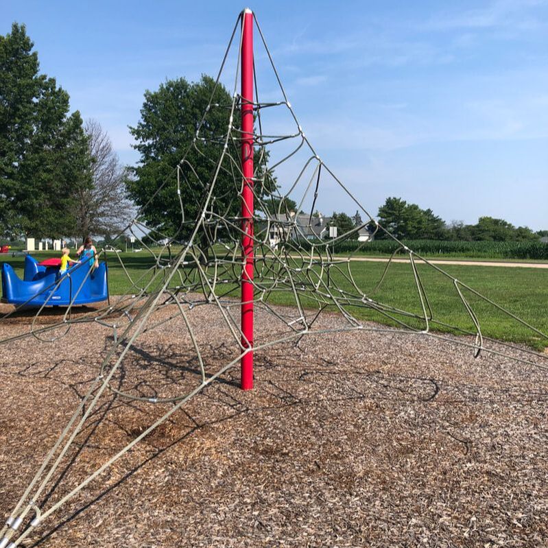 wire pyramid shaped climbing tower at Homer Adams Park in Godfrey IL. Parks in Godfrey IL