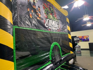 Zombie themed bounce house at riverbend bounce in Wood River