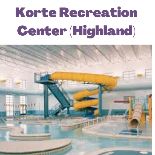 Pool with children's slide and large yellow slide labeled in purple Korte Recreation Center in Highland, IL