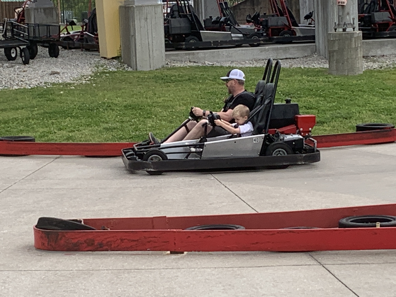 Man and Boy on Bumper Car at the Tracks in Branson, IL.