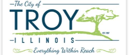 Picture with the words Troy Illinois Everything within Reach.  Blue lettering and green tree.
