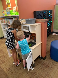 Roxana Illinois Library kids room with play kitchen